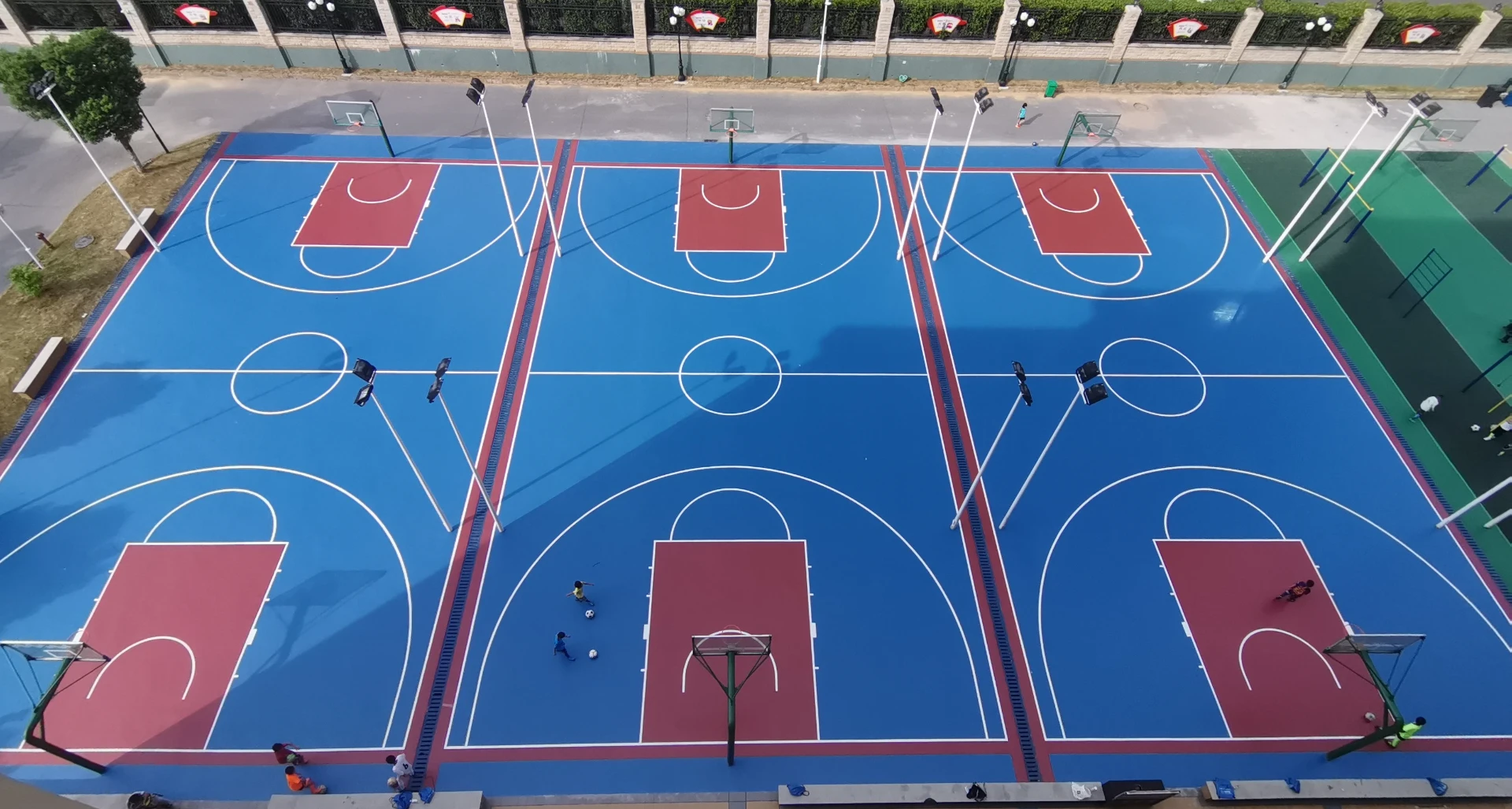 what are outdoor basketball courts made of